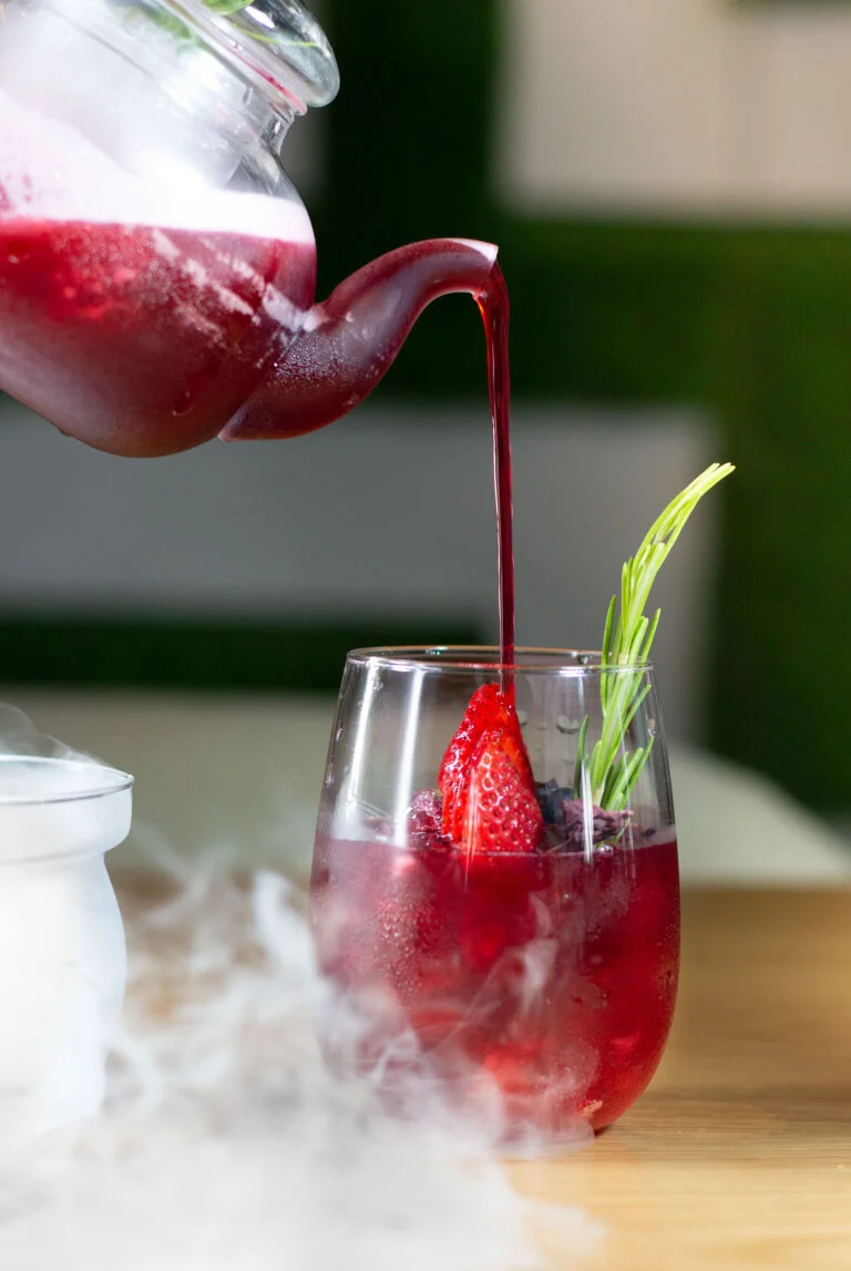 A cold drink being poured at Unwind